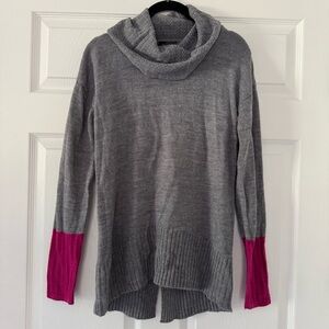 The limited gray/pink cowl neck sweater